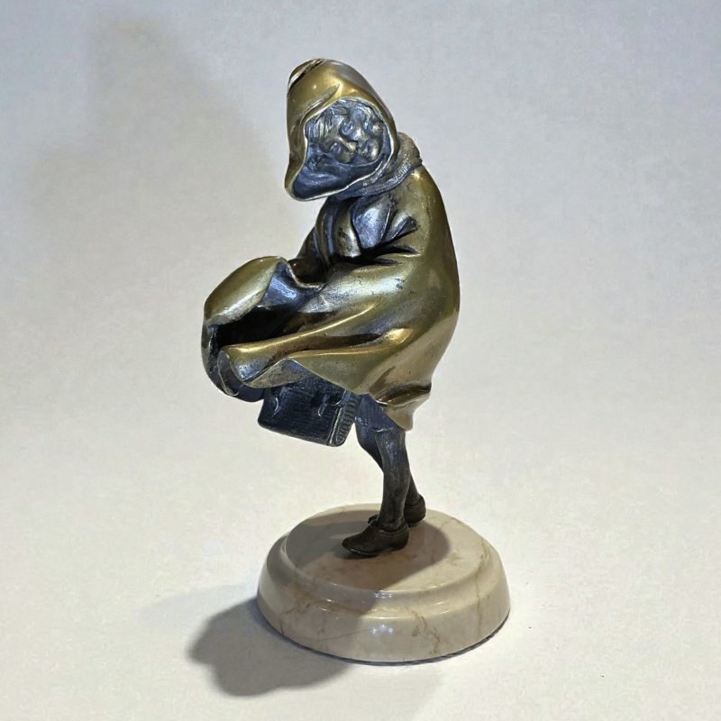 An Art Deco Patinated Bronze Figure Of A Young Girl. H. Chiparus