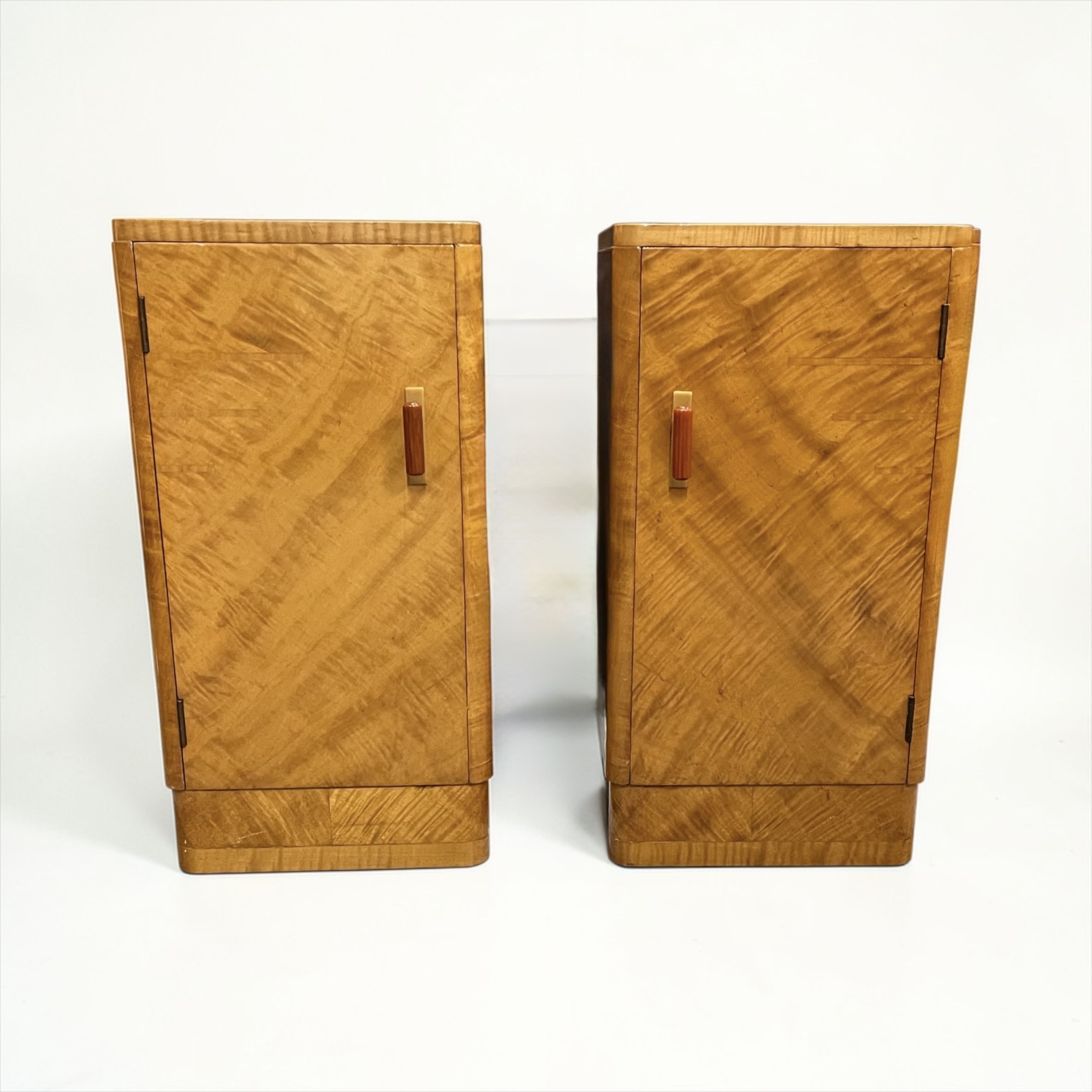 A Pair Of Art Deco Bedside Tables