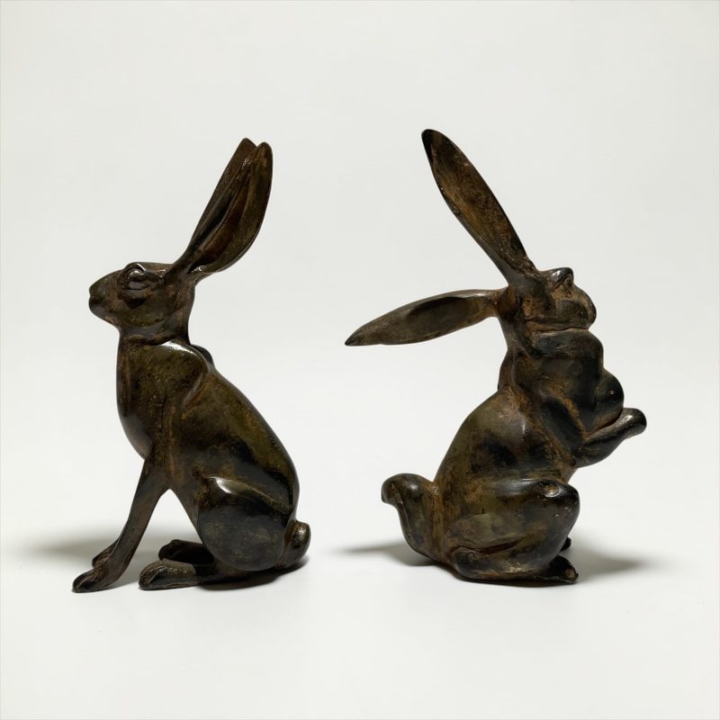 A Pair of Stylised Bronze Hares