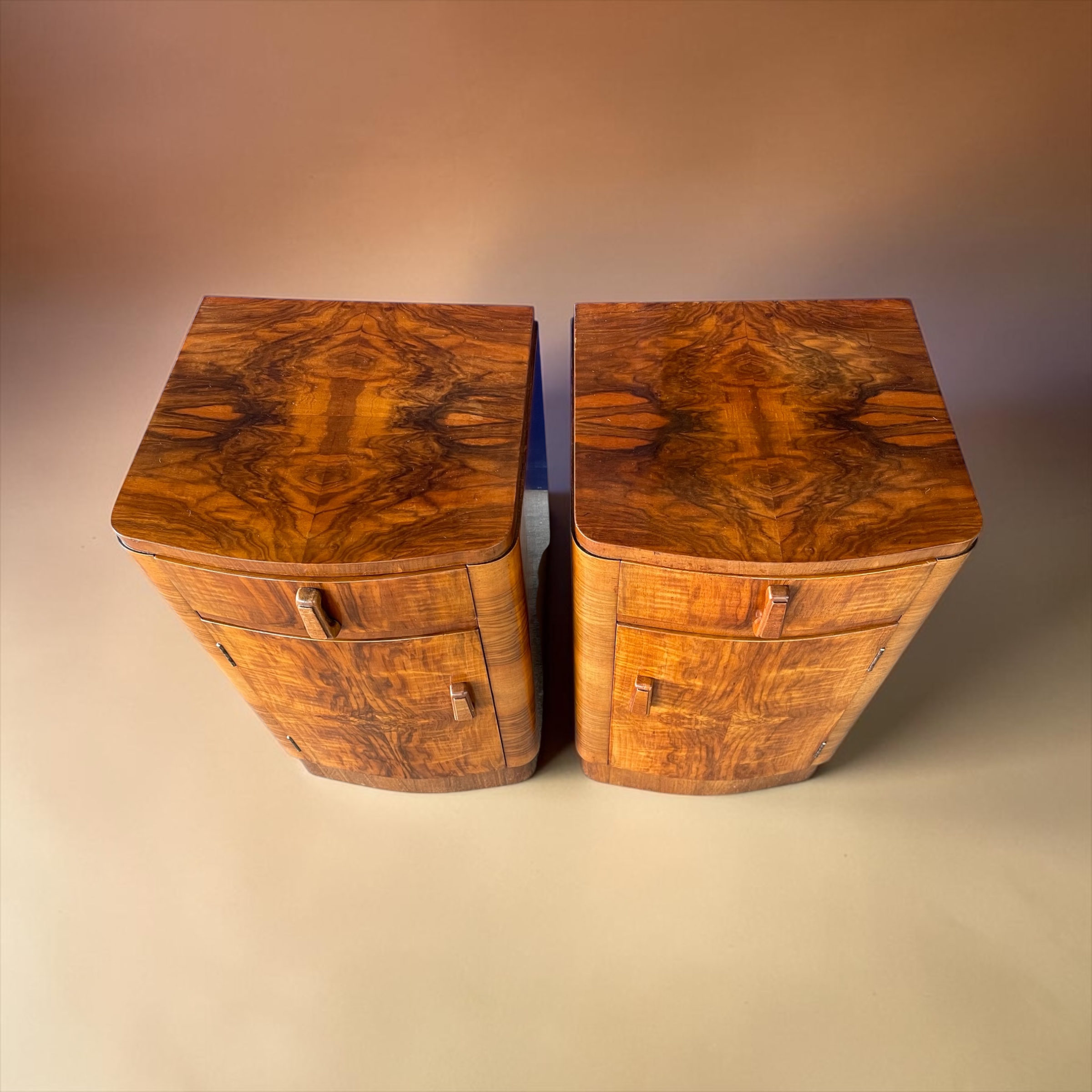 A Pair Of Art Deco Bedside Tables