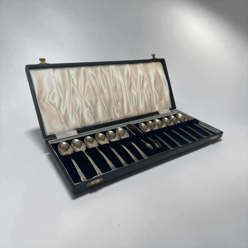 Set of Twelve Silver Teaspoons and Sugar Tong